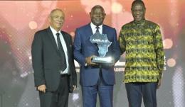 Equity Group Holdings CEO & MD Dr. James Mwangi (center) displays his Lifetime Achievement Award at the All-Africa Business Leaders Award in Sun City, South Africa.